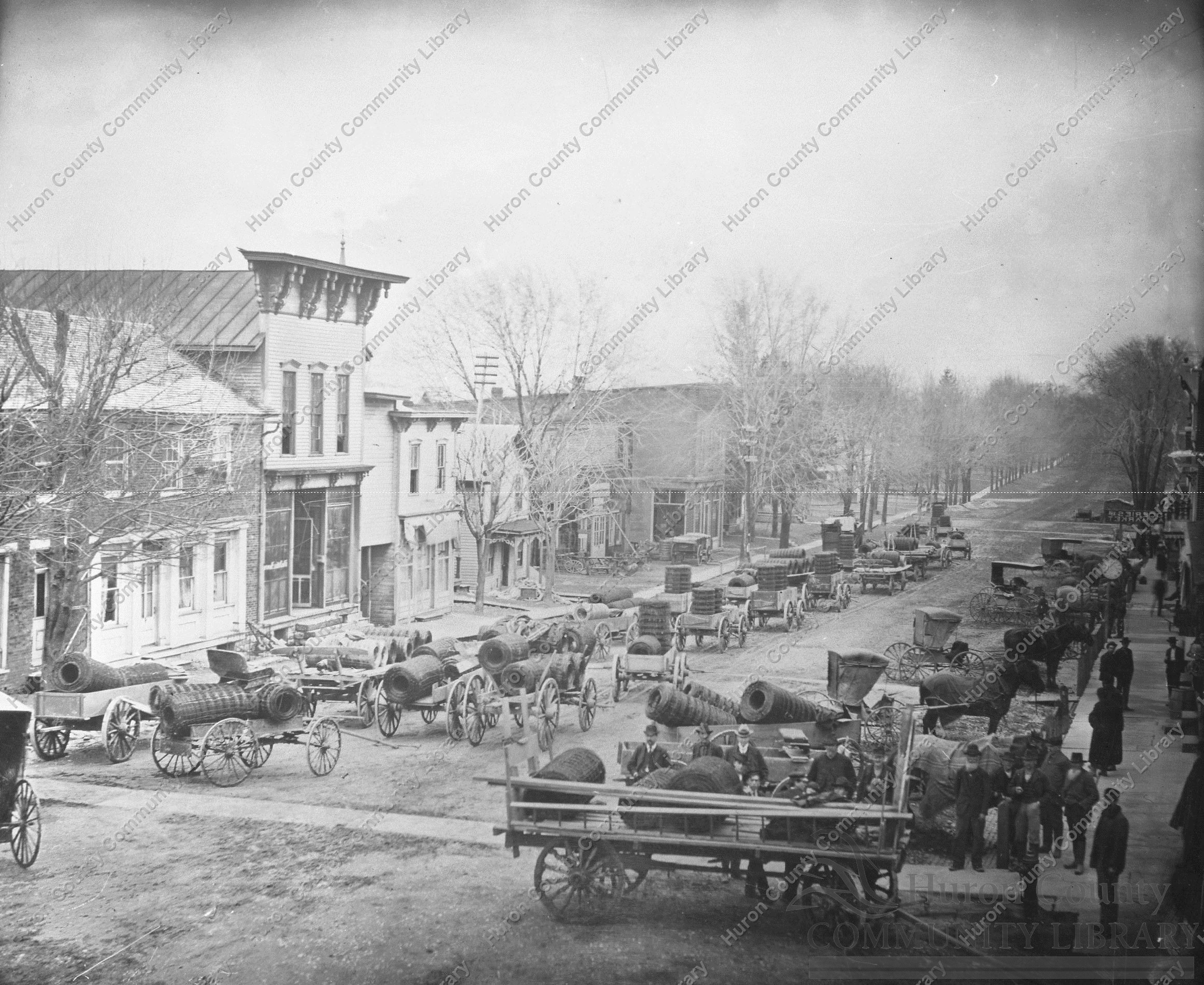 Fence Day at Attica, OH Farmer's loaded wagons with fence ordered