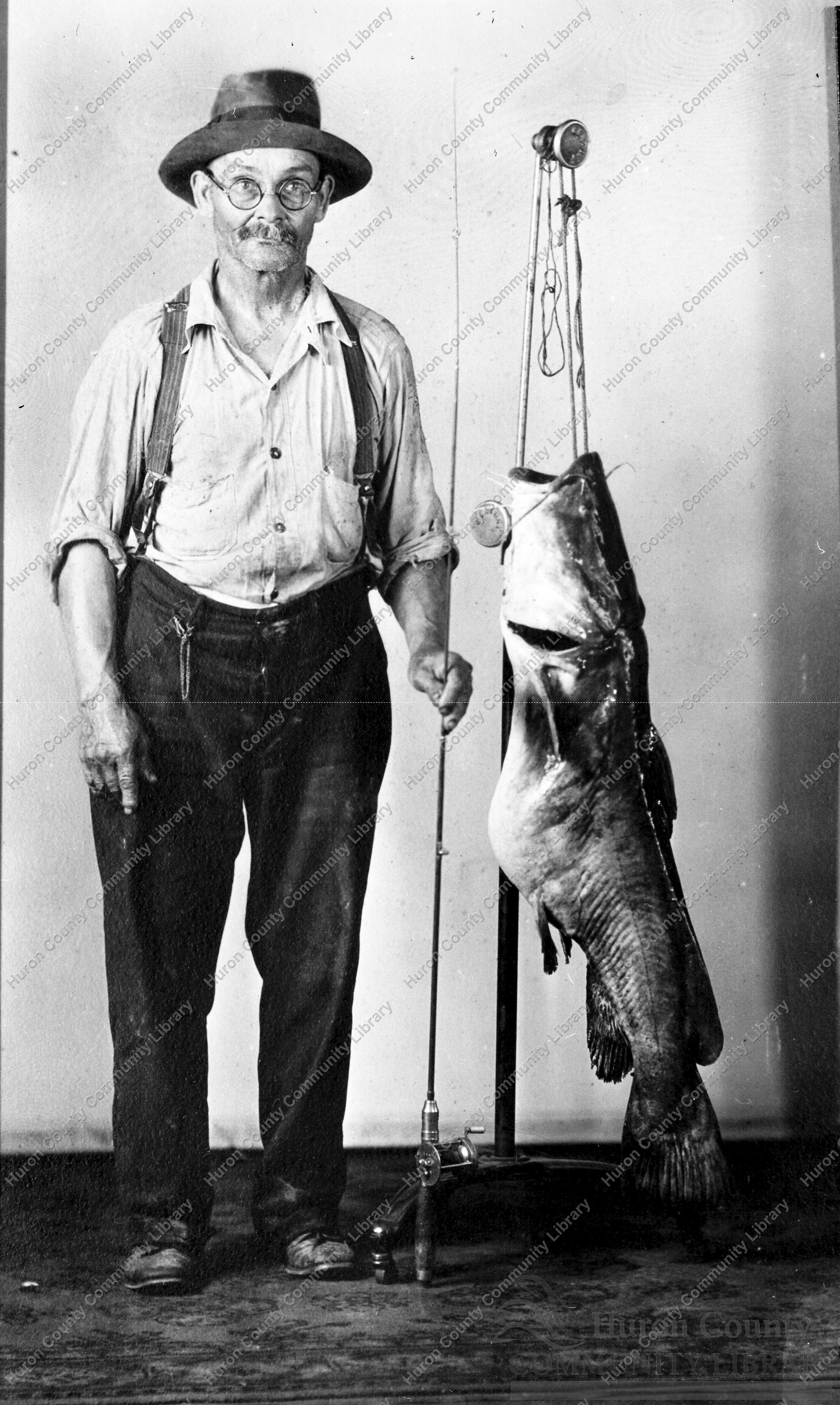 Claud Green and his 48 1/2 inch Catfish 1924