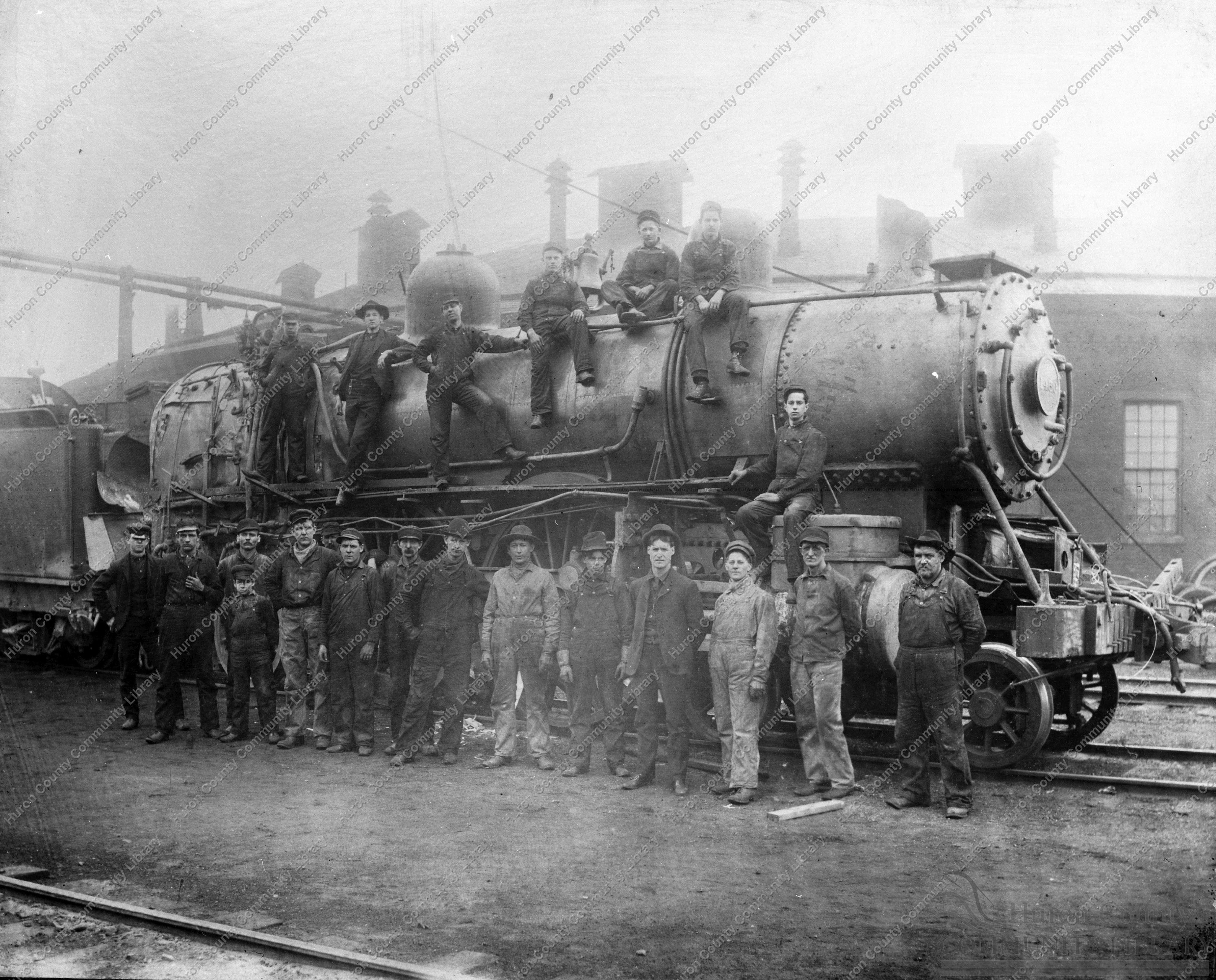 Locomotive 1450 wrecked - Roundhouse in background 1902
