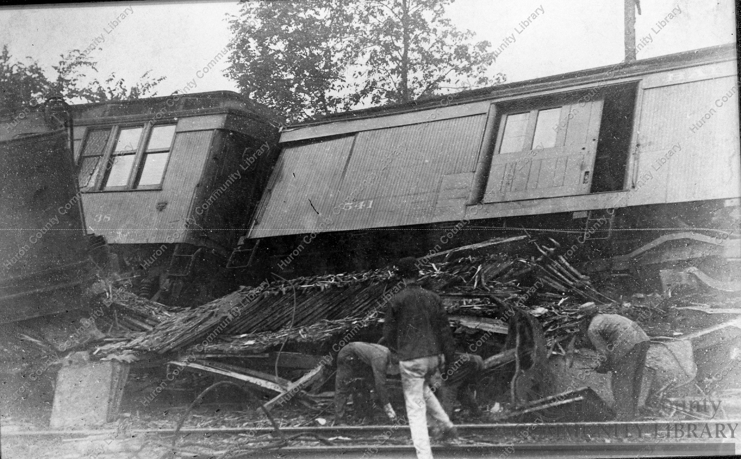 Wreckage from wooden cars on R.R.