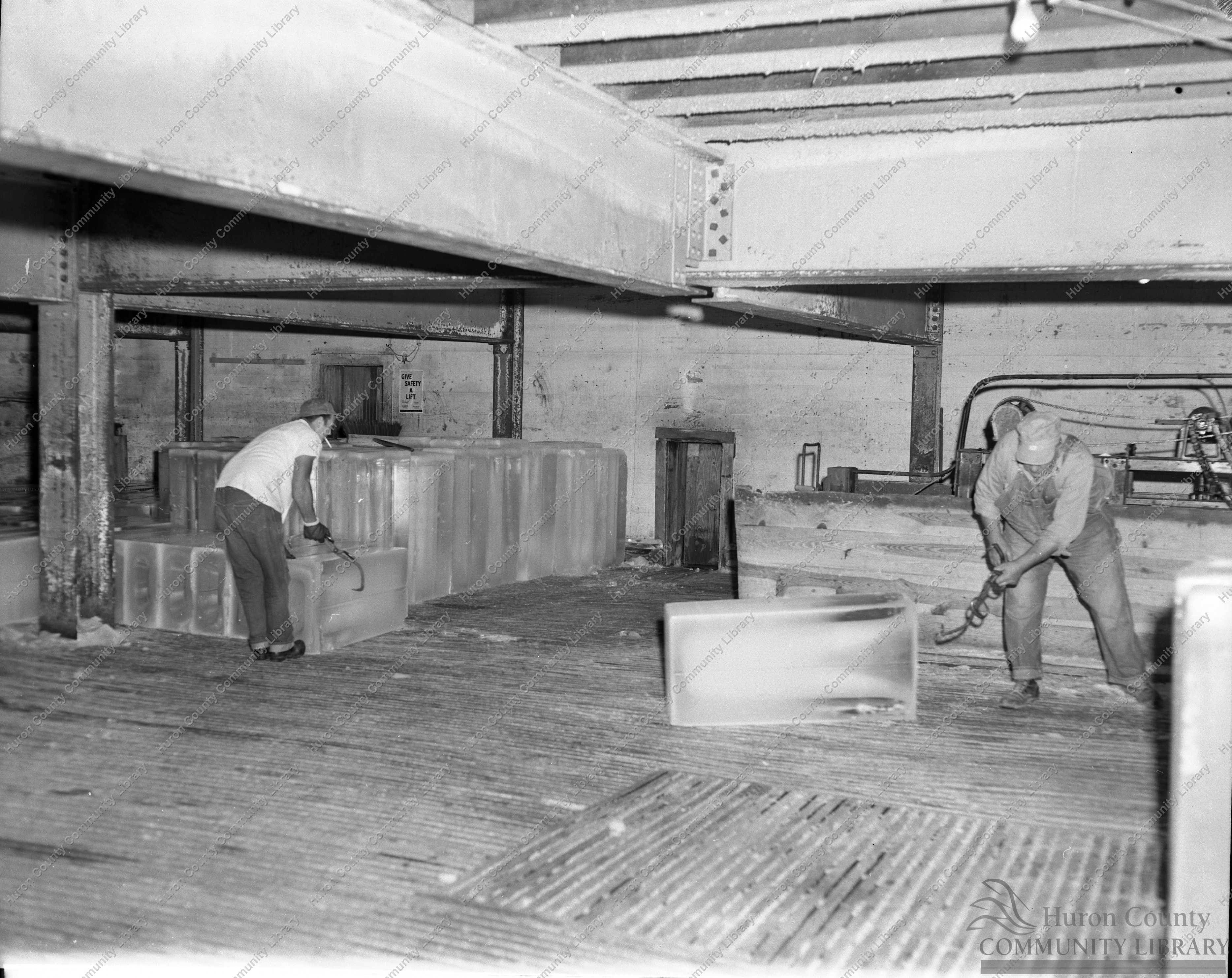 Railway Ice Co. showing the handling of cakes of ice @ 300lbs each